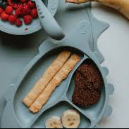 BPA-free dinosaur feeding set stays put on table
